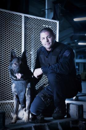 Police officer with service dog