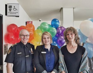 Chief Clive Weighill, Rachel Loewen Walker, Executive Director of OUTSaskatoon, and Miki Mappin, Board Member of TransSask Support Services Inc.