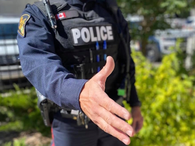 Officer extending hand